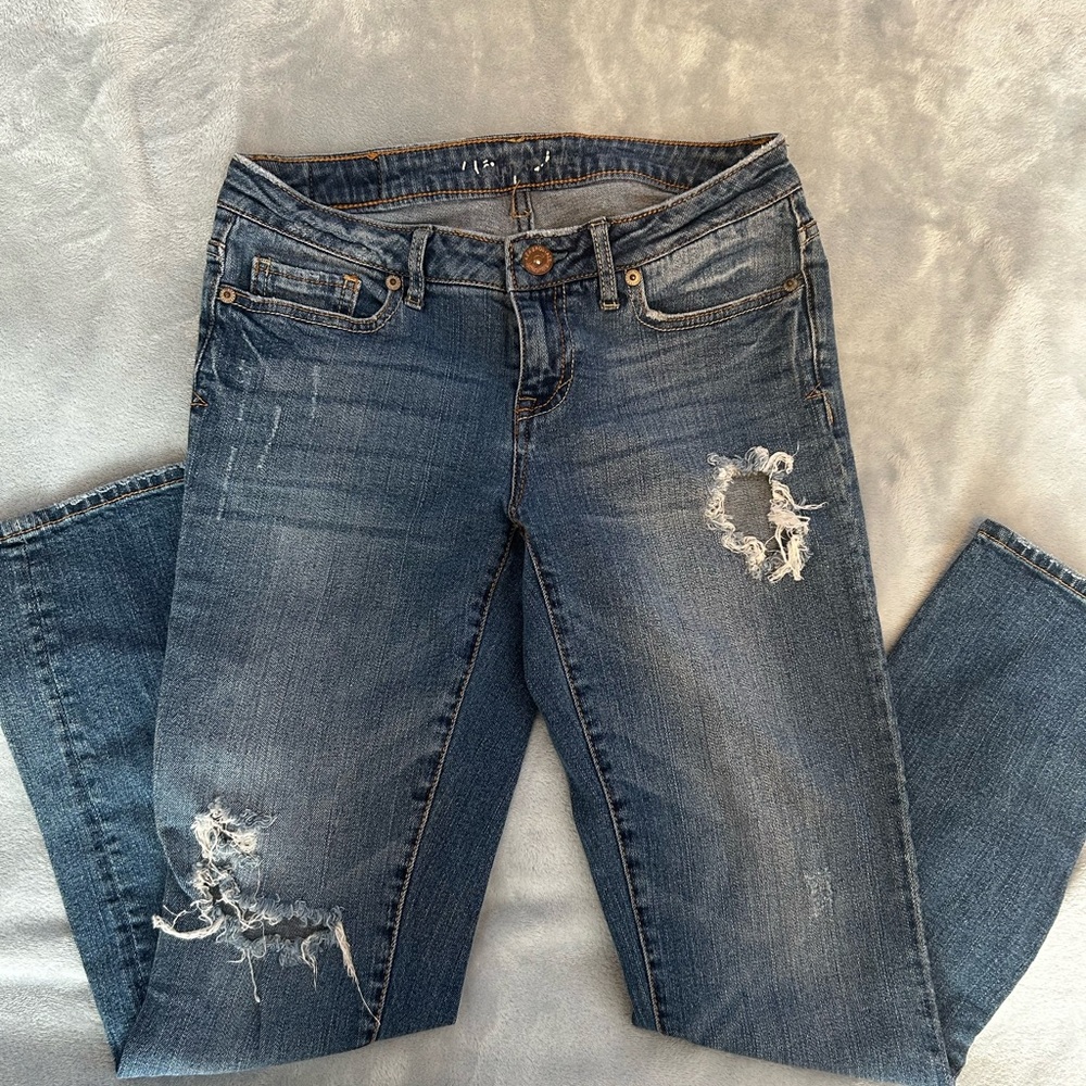 Distressed Blue Jeans
